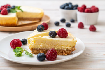 Homemade cheesecake with raspberries and blueberries