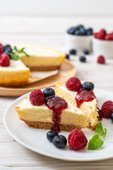 Homemade cheesecake with raspberries and blueberries