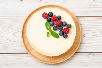 Homemade cheesecake with raspberries and blueberries