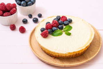 Homemade cheesecake with raspberries and blueberries
