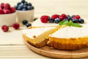 Homemade cheesecake with raspberries and blueberries