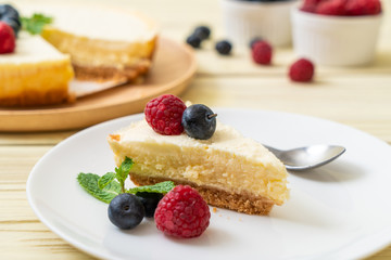 Homemade cheesecake with raspberries and blueberries