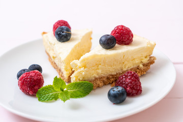 Homemade cheesecake with raspberries and blueberries