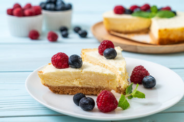 Homemade cheesecake with raspberries and blueberries