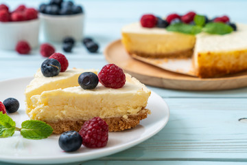 Homemade cheesecake with raspberries and blueberries
