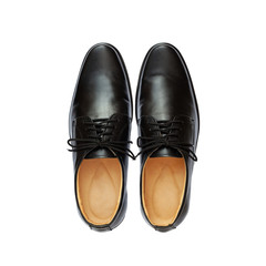 Male black leather shoes isolated on white background. Objects with clipping path. top view