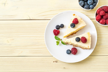 Homemade cheesecake with raspberries and blueberries
