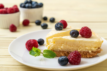Homemade cheesecake with raspberries and blueberries