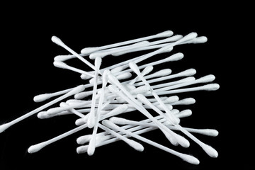 Cotton Buds isolated on black background.