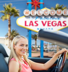 travel, road trip and people concept - happy young woman driving convertible car over welcome to...