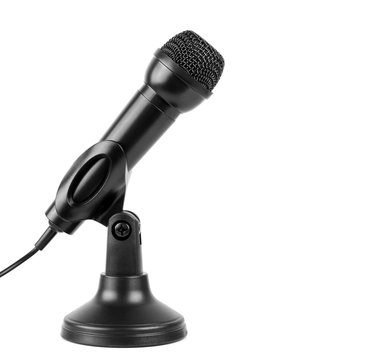 A black microphone at a high angle on a stand against a white background with copy space for your text