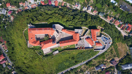 Aerial top view on the ancient castle of Palanok and the foothills of Carpathians Mountains, in Mukachevo, the Transcarpathian region of Ukraine.