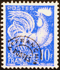 Cock on a vintage french postage stamp