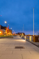 View of the marina and port in Bodo at night. Norway. Skyline of city.