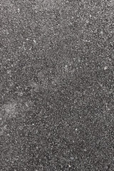 Dark asphalt surface, texture background.