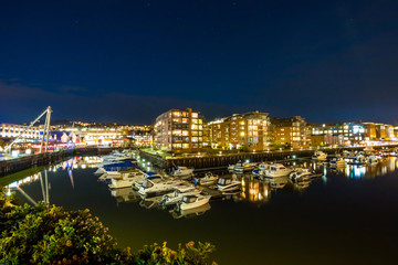 Fototapeta na wymiar View of the marina and port in Trondhemi at night. Norway. Skyline of city. 