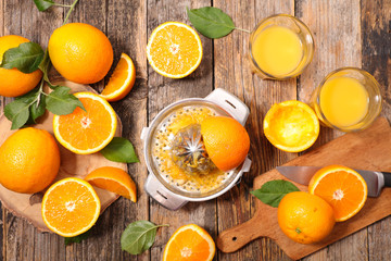 orange juice on wood background