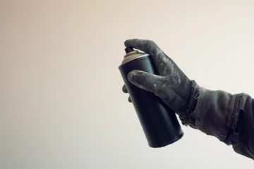 Photo sur Aluminium Graffiti Graffiti artist holding color spray can