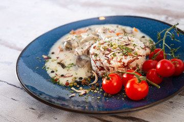 blanquette of veal with porcini mushrooms and rice duo