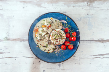 blanquette of veal with porcini mushrooms and rice duo