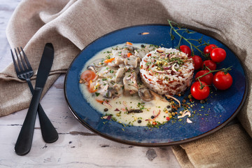 blanquette of veal with porcini mushrooms and rice duo