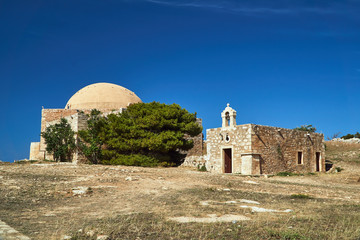 Orthodox church and Turkish mosque in the city of Rethymnon on the island of Crete.