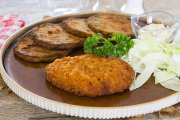 escalope  pané et galettes de légumes