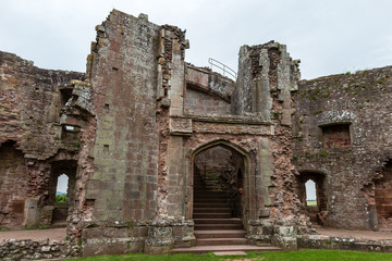 Inside the courtyard and walls of a ruined medieval castle (Raglan Castle)