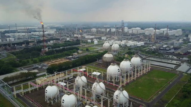 Establishing drone shot of oil and gas processing plant in Indonesia