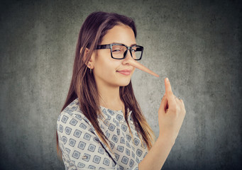 Sly tricky woman with long nose. Liar concept.
