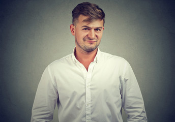 Obraz premium Doubtful man looking in disbelief
