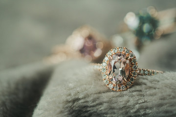 Jewelry luxury diamond ring closeup on fabric texture background
