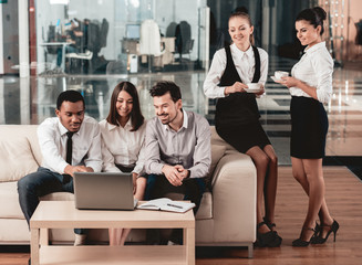 Obraz premium Young multirass team gathered in office