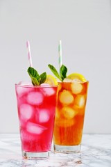 Iced lemonade isolated. Assortment of cold coctails in the glass