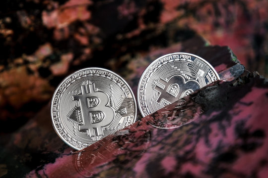 Silver bitcoin in the stone