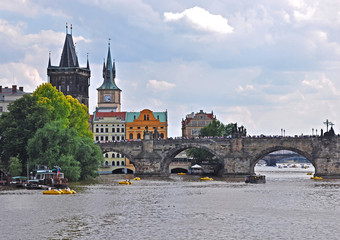 View from the surface of the Vltava River to the historical Gothic Charles Bridge - Prague, Czech Republic. UNESCO.