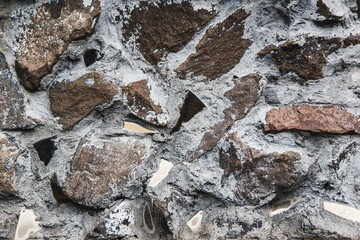 Texture Brown stone in the concrete
