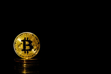 Bitcoin is symbol of cryptocurrency - electronic money on black background, For banking and international payment concept.