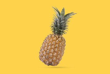 Creative Ripe pineapple on yellow background. fruit for tropical.