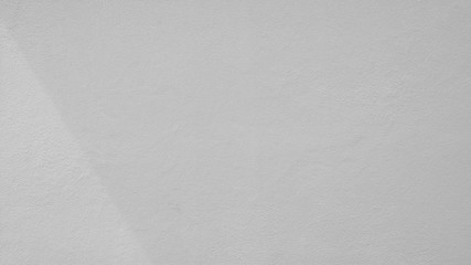 white concrete wall with shadow from window - background