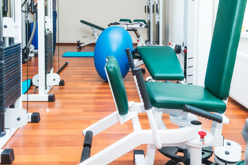 Close up equipment for rehabilitation in interior of physiotherapy clinic. Physical therapy center. Selective focus, copy space