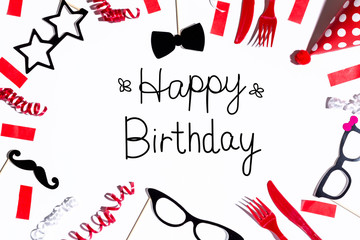 Birthday message with party decorations on a white background