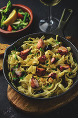 Tasty pasta with octopus and herbs