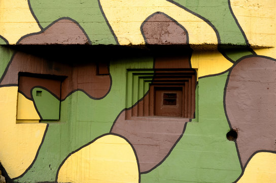 An old bunker from World War II repainted
