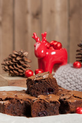 Homebaked Chocolate And Cherry Brownie. Christmas Decorations.