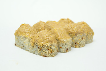 tasty fresh sushi rolls lying on a white background