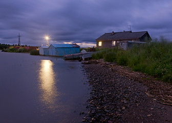 Fototapeta na wymiar Night scene of a village in the Russian province.