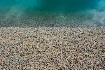  stones and water concept from above with empty space for copy or text