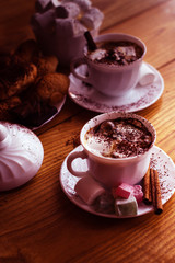 Cocoa with marshmallow. Delicious cuisine in the kitchen. Croissants with chocolate.
