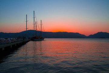 Fototapeta na wymiar sunrise and wharf in Marmaris,Turkey